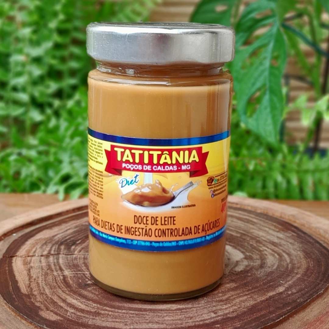 doce-de-leite-diet-tatitania Doce de leite diet Tatitânia em pode te 400 gramas sobre mesa de madeira.