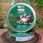Figo ramy caramelizado Reserva de Minas, em lata de 600 grama sobre mesa de madeira.