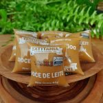 doce de leite bisnaga Tatitânia em embalagem com 80 gramas.
